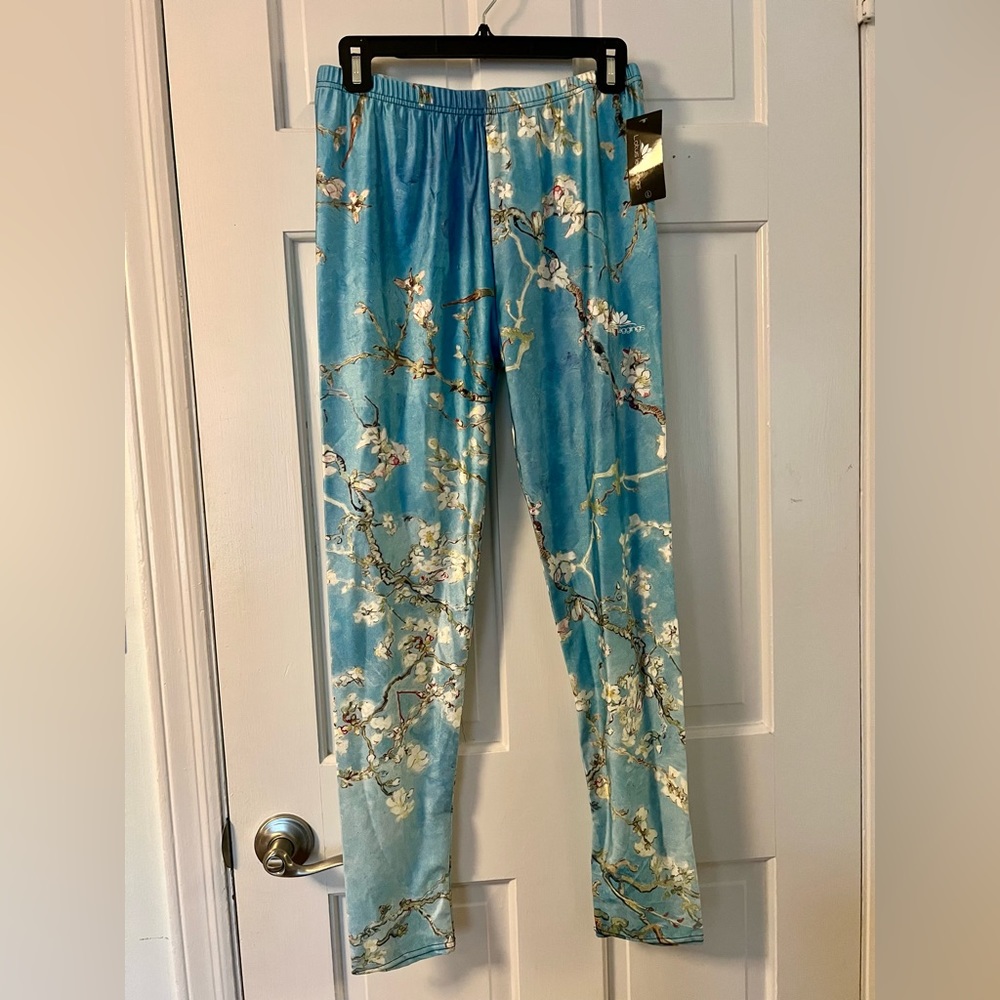 NWT Lotus Leggings with a pale blue cherry blossom pattern.